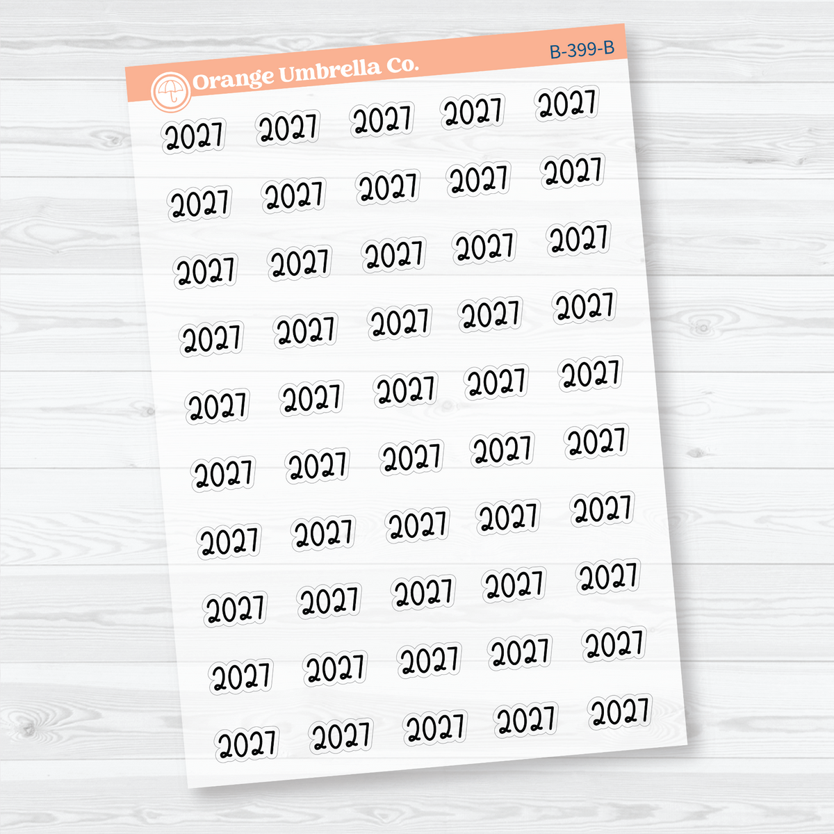Sheet of 50 mini black 2027 year label stickers on transparent clear matte paper for planners and journals.